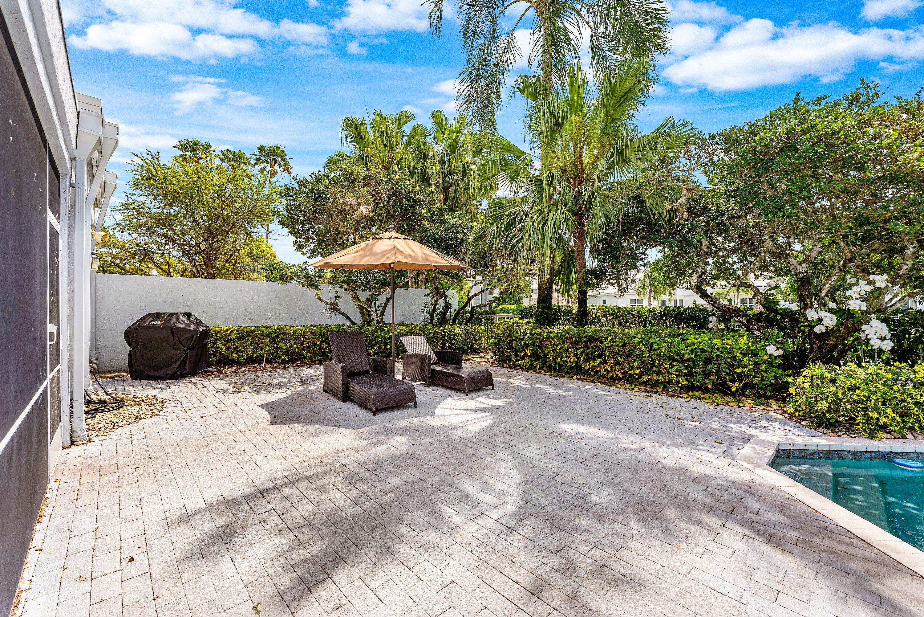 5863 Waterford Boca Raton, FL 33496 - Photo 36 of 90 a view of a backyard with sitting area and furniture