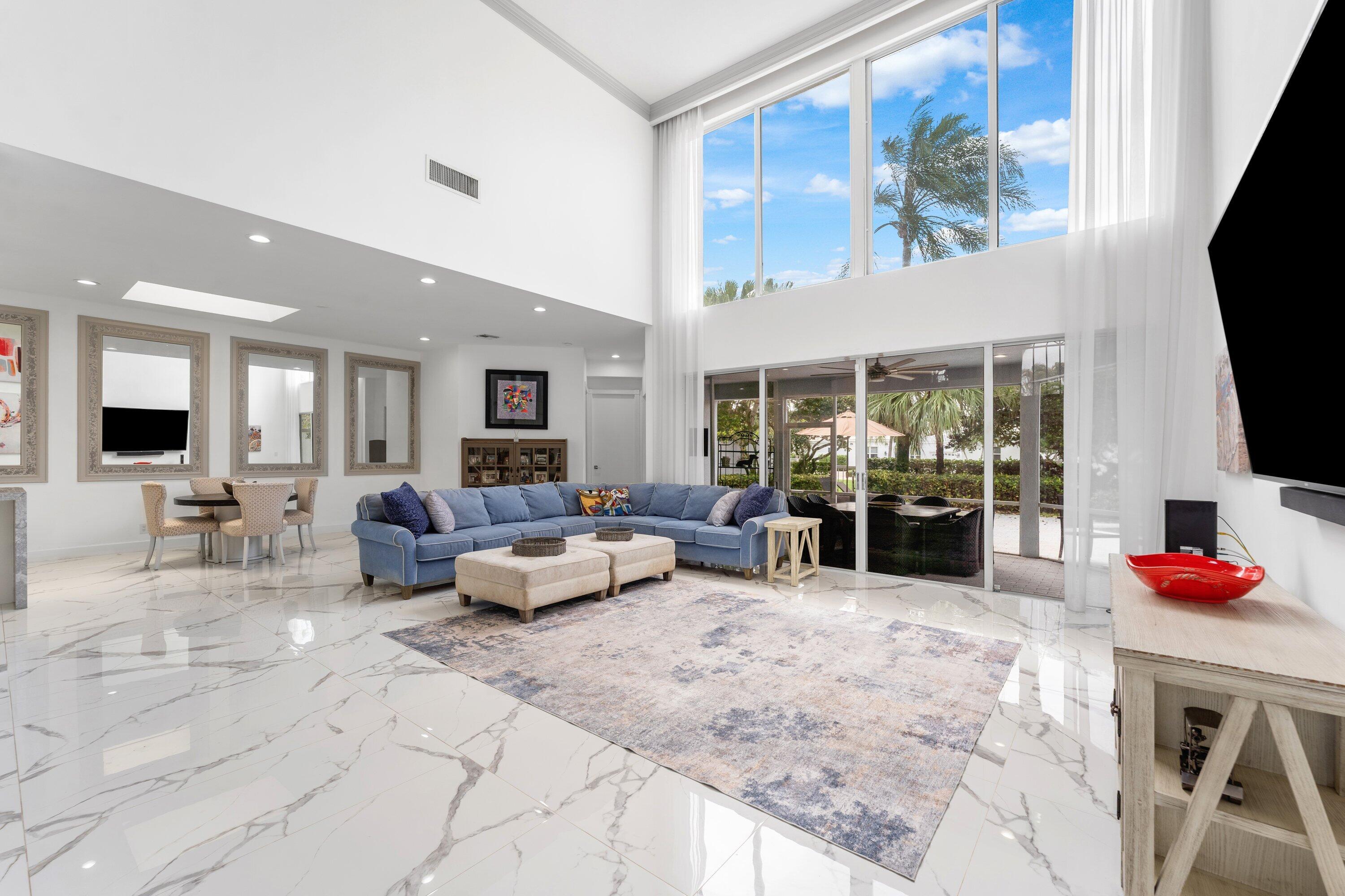 5863 Waterford Boca Raton, FL 33496 - Photo 6 of 90 a living room with furniture and flat screen tv