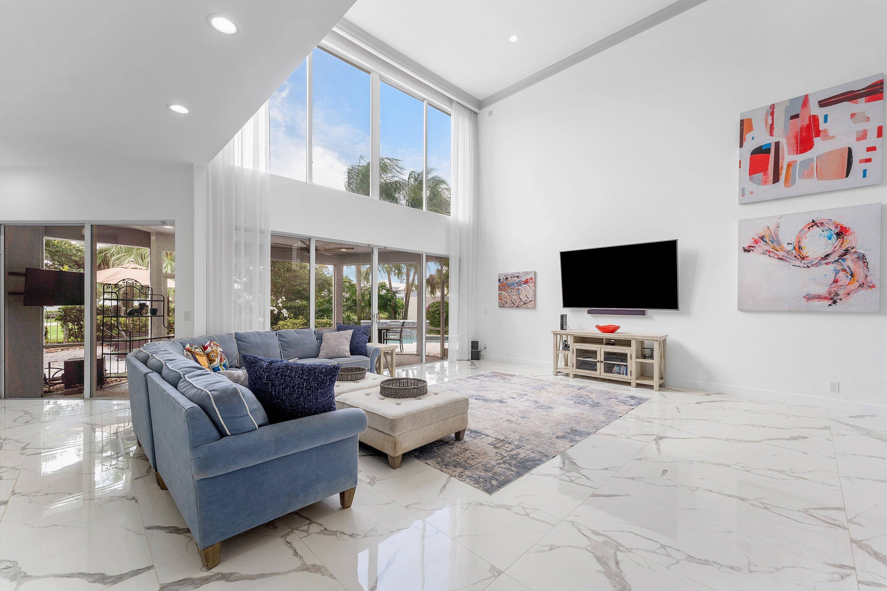 5863 Waterford Boca Raton, FL 33496 - Photo 8 of 90 a living room with furniture and a flat screen tv