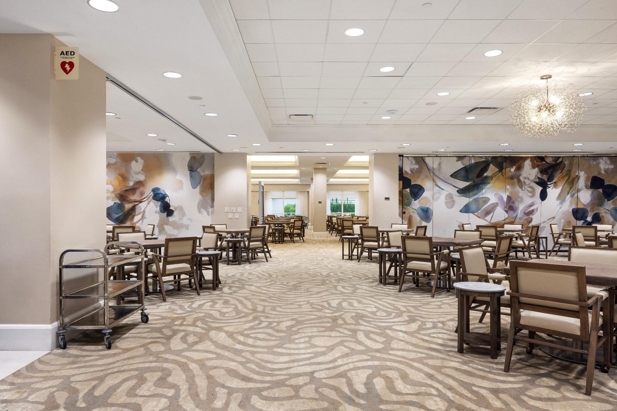 5863 Waterford Boca Raton, FL 33496 - Photo 85 of 90 a room with lots of tables a large window and chairs