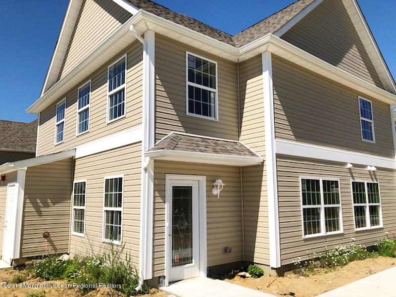 8 Abbey Road Tinton Falls, NJ 07753 - Photo 1 of 6 a view of a house with door