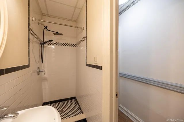 a bathroom with a sink and toilet