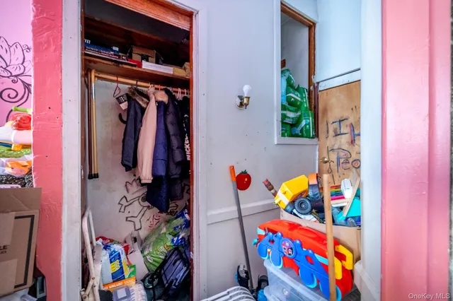 a view of a hallway and dining room