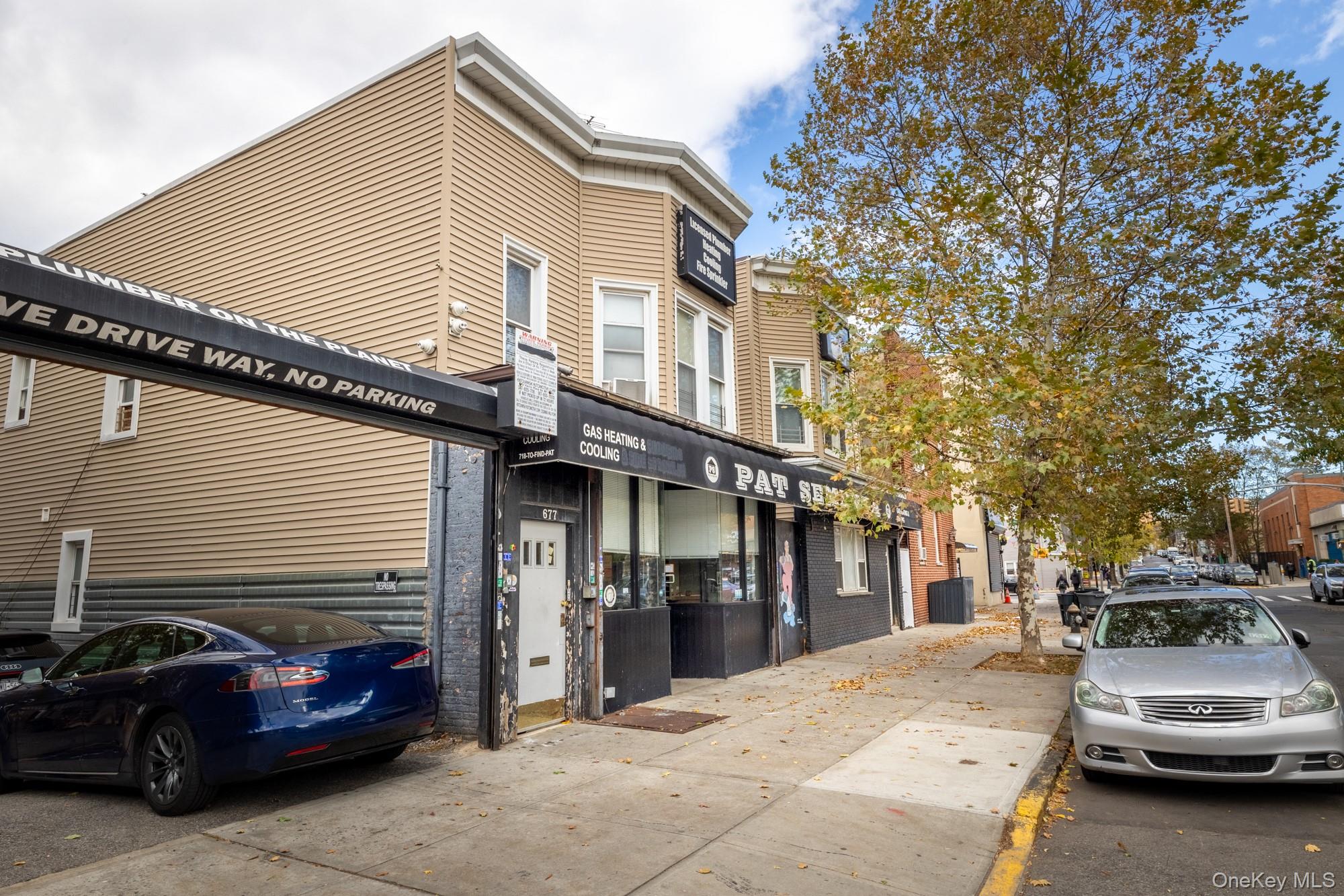 677 Van Nest Avenue Bronx, NY 10462 - Photo 3 of 49 a view of a car park in front of house
