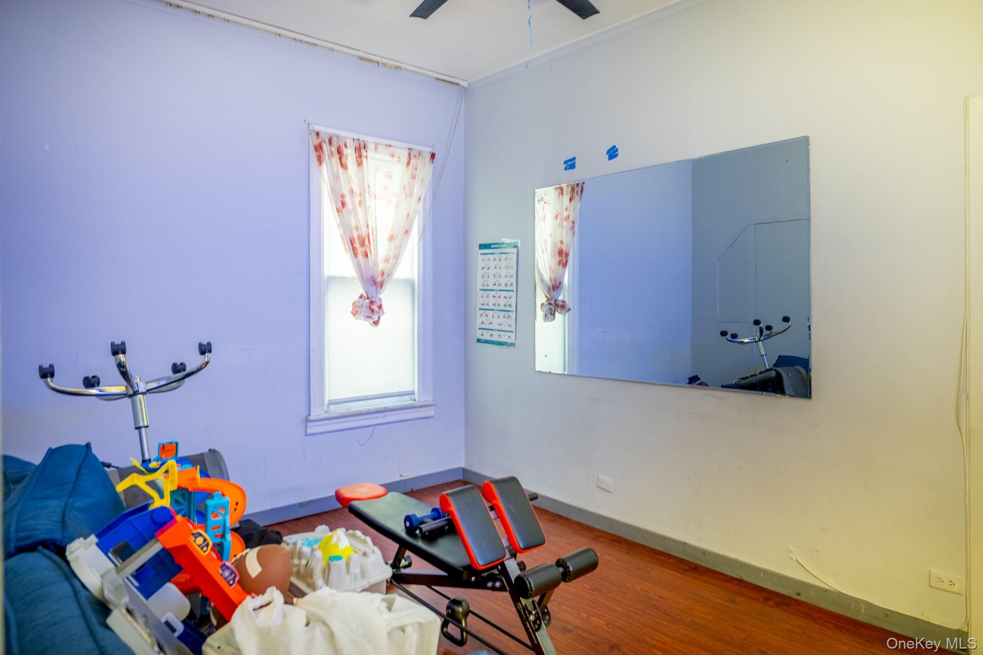 677 Van Nest Avenue Bronx, NY 10462 - Photo 32 of 49 a room with furniture and a window