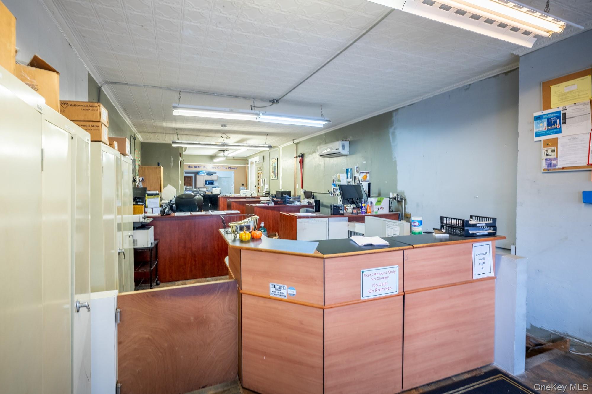 677 Van Nest Avenue Bronx, NY 10462 - Photo 4 of 49 a room with counter space and painting on the wall