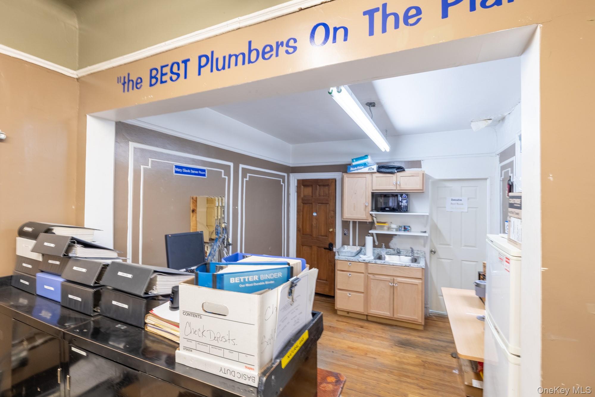 677 Van Nest Avenue Bronx, NY 10462 - Photo 7 of 49 a living room with kitchen island granite countertop furniture and a sink