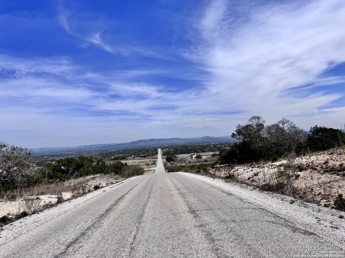 247 Highgate Drive Bandera, TX 78003 - Photo 15 of 21 a view of balcony with furniture and city view