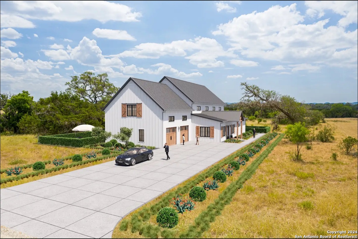 247 Highgate Drive Bandera, TX 78003 - Photo 9 of 21 a front view of a house with a yard