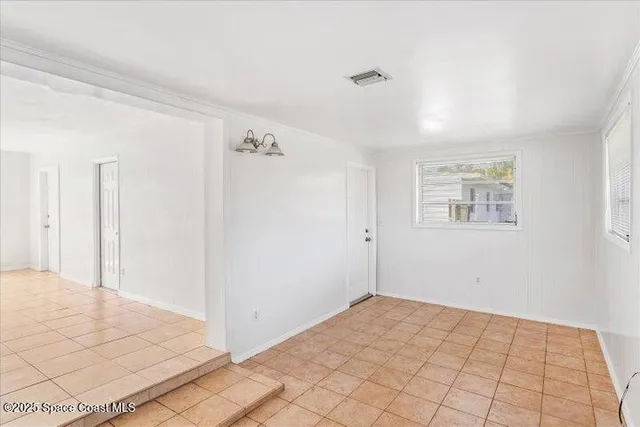 a kitchen with stainless steel appliances granite countertop a sink stove and microwave