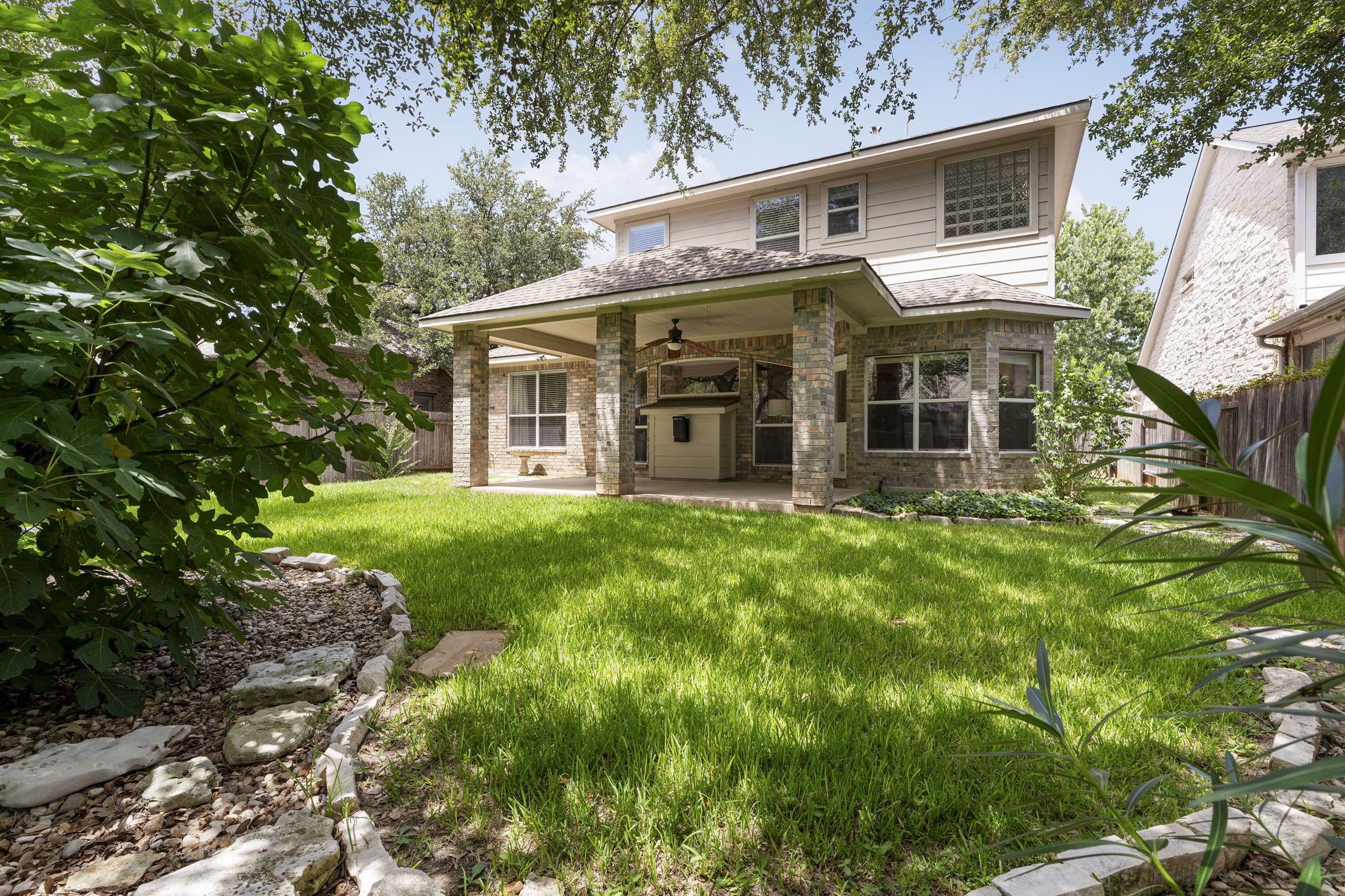 1822 Nelson Ranch Loop Cedar Park, TX 78613 - Photo 35 of 40 A spacious lawn provides room for recreation, gardening, or additional outdoor features.