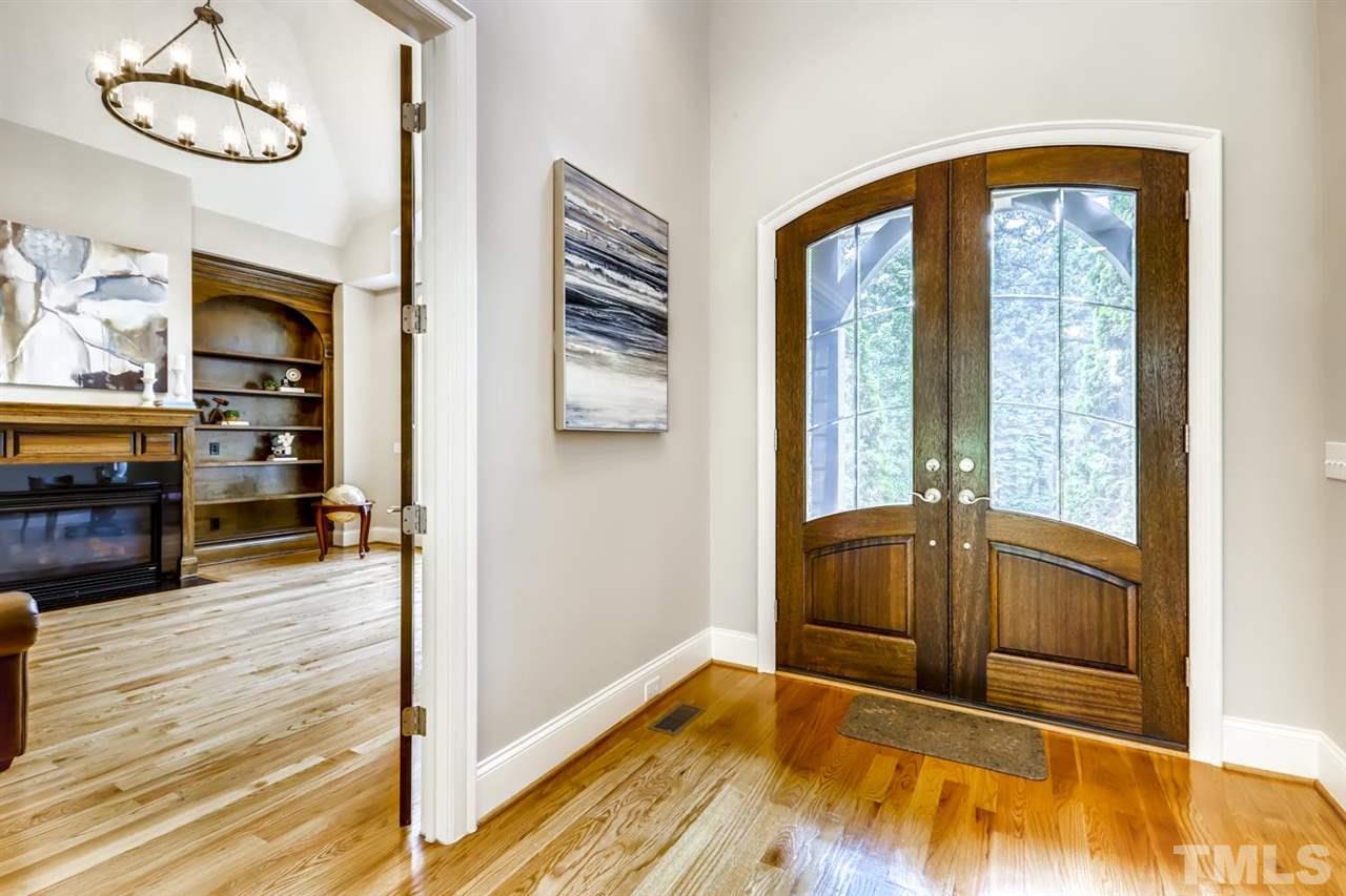 1408 Caistor Lane Raleigh, NC 27614 - Photo 4 of 18 Beautiful architectural details throughout this home. The family room has tons of cabinet space and shelving!!