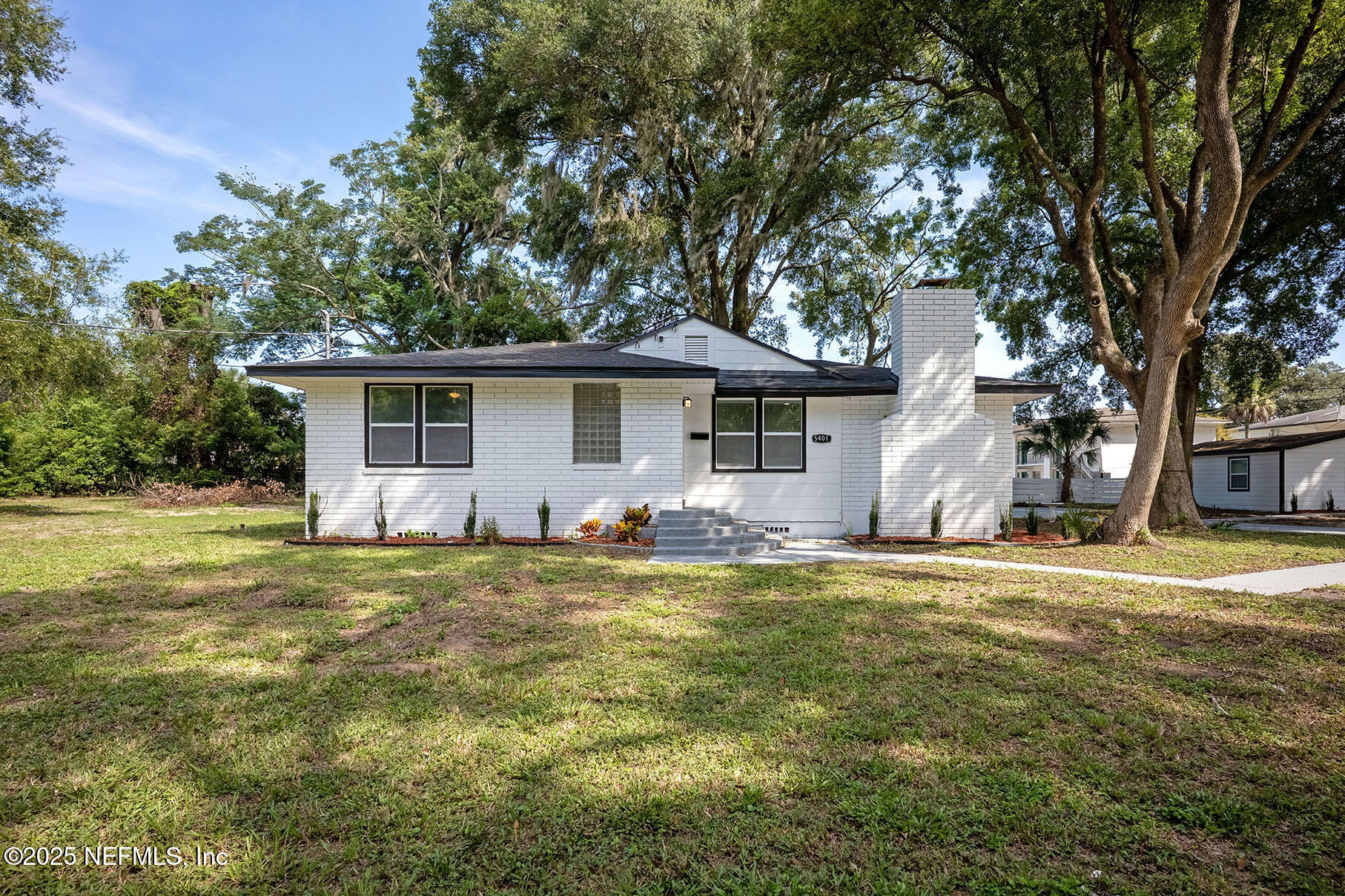 5401 Burdette Road Jacksonville, FL 32211 - Photo 1 of 53 a backyard of a house
