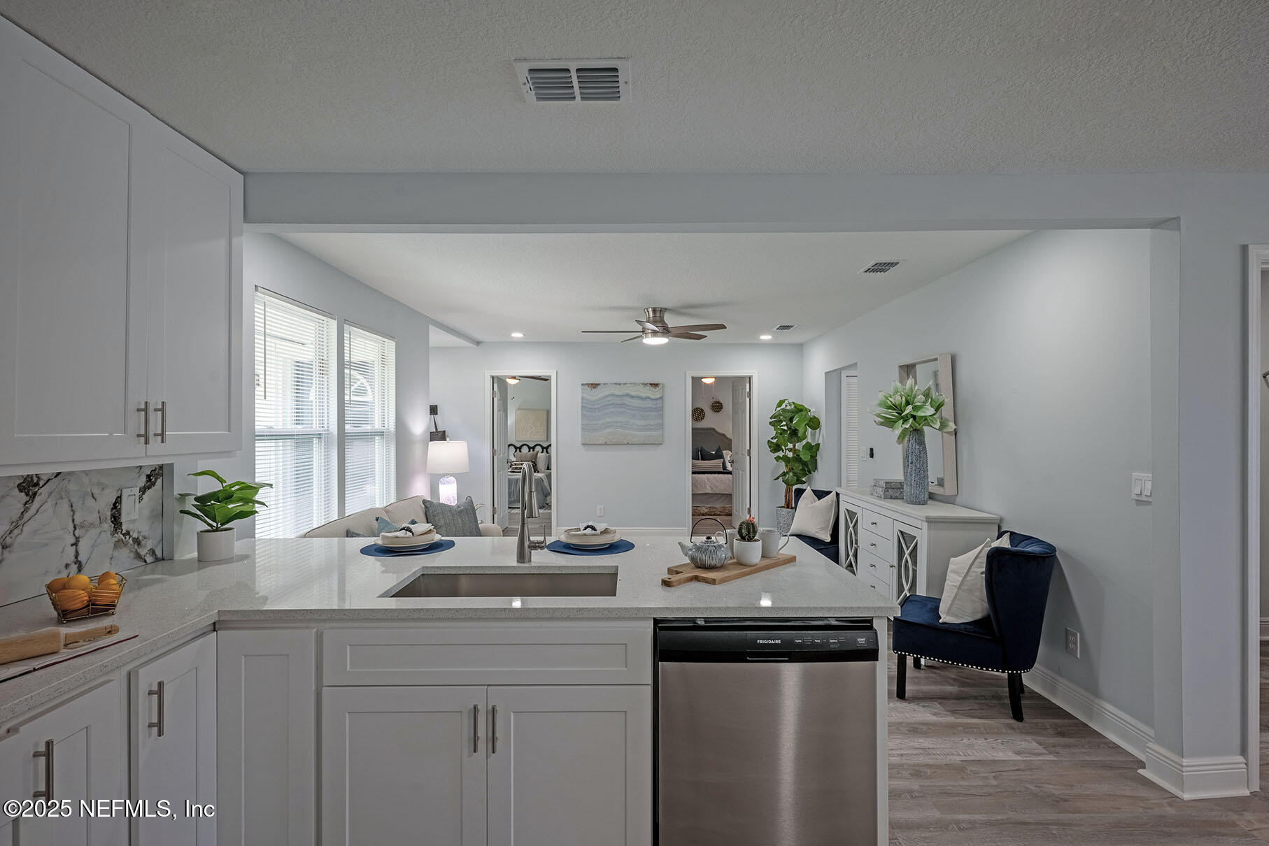 5401 Burdette Road Jacksonville, FL 32211 - Photo 13 of 53 a kitchen with stainless steel appliances a sink a stove and a refrigerator