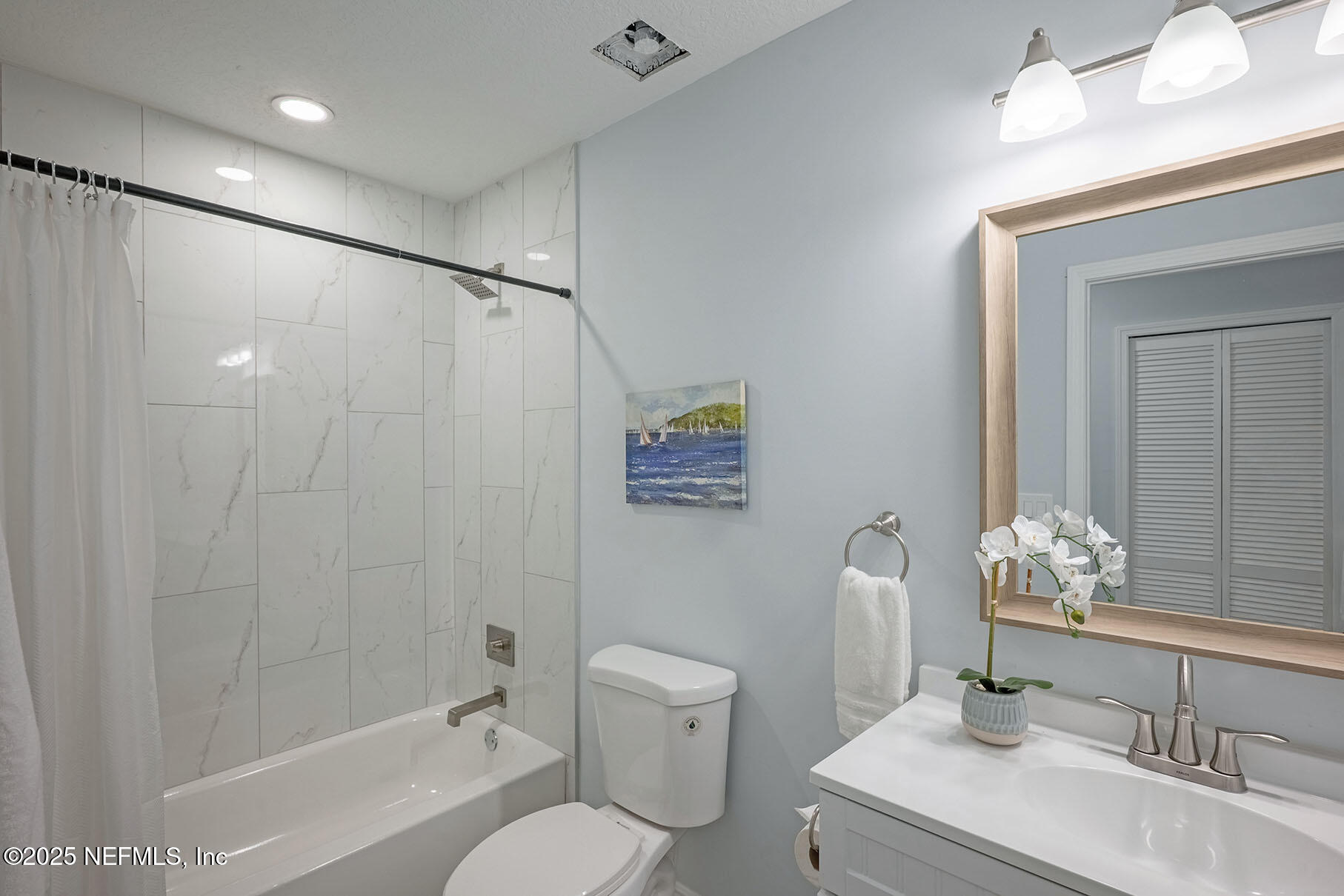 5401 Burdette Road Jacksonville, FL 32211 - Photo 20 of 53 a bathroom with a sink toilet and shower