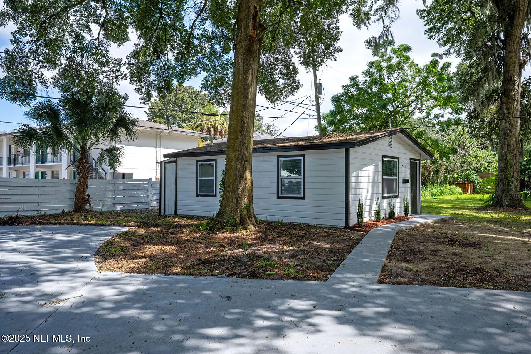 5401 Burdette Road Jacksonville, FL 32211 - Photo 33 of 53 a view of a house with a yard