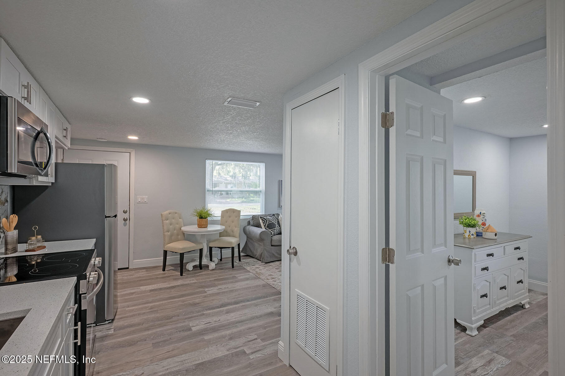 5401 Burdette Road Jacksonville, FL 32211 - Photo 41 of 53 a view of a kitchen from the hallway