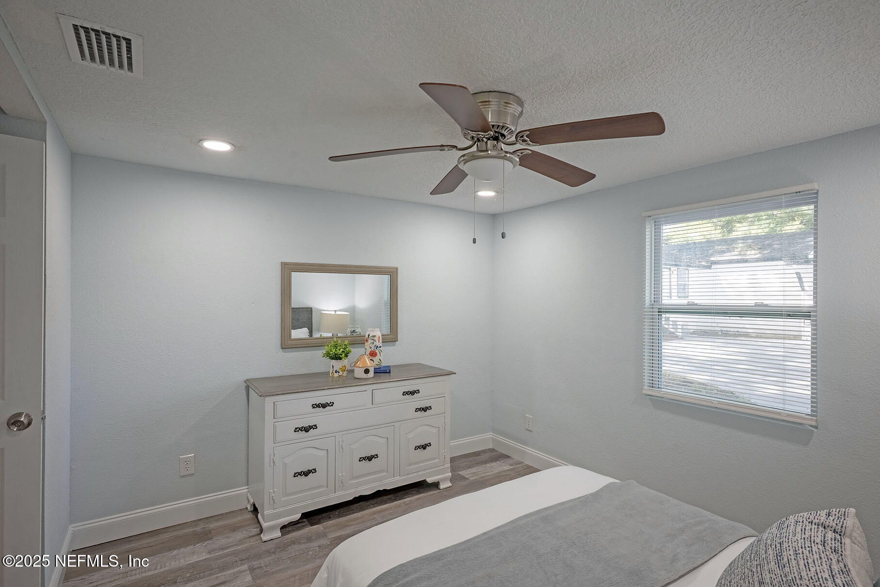5401 Burdette Road Jacksonville, FL 32211 - Photo 44 of 53 a bedroom with a bed and a window