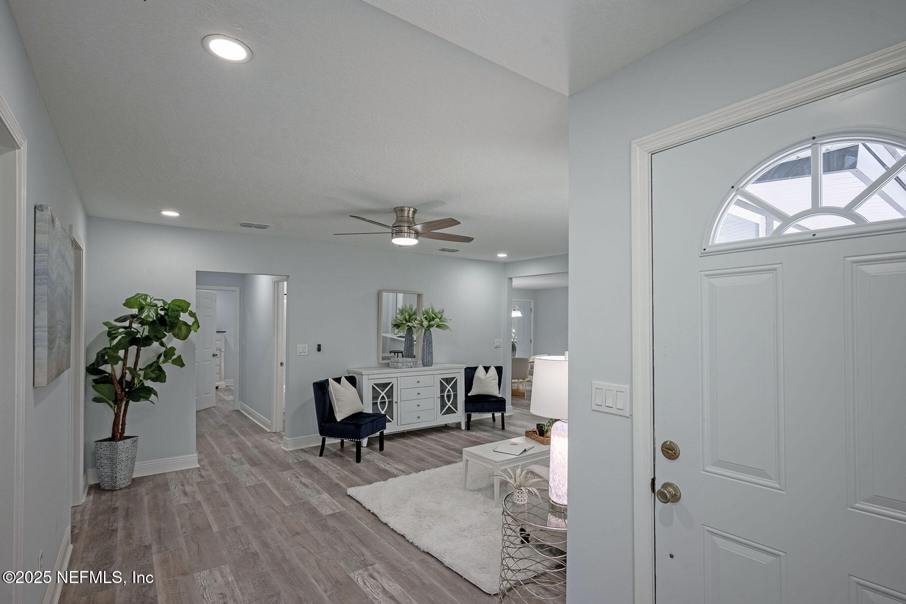 5401 Burdette Road Jacksonville, FL 32211 - Photo 6 of 53 a view of a livingroom with furniture and a potted plant
