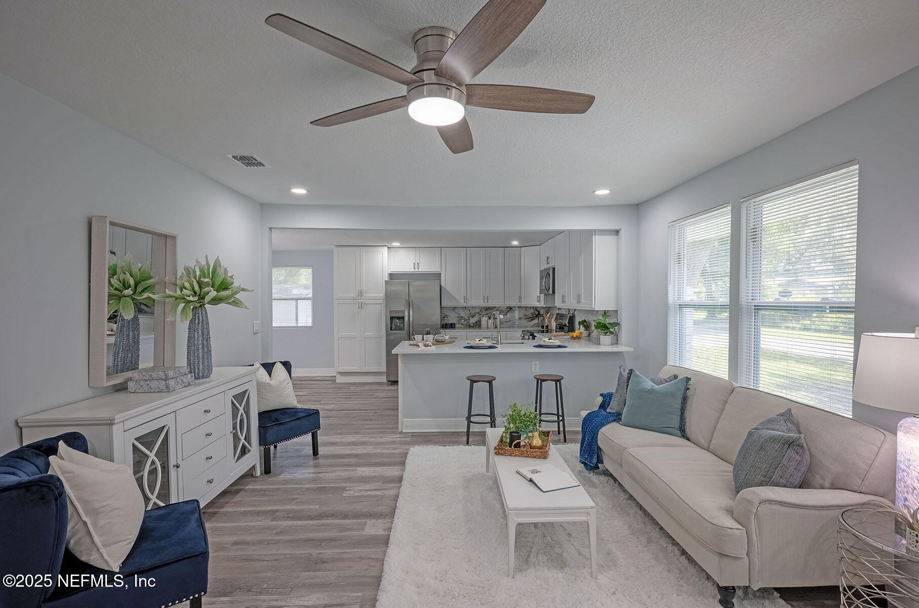 5401 Burdette Road Jacksonville, FL 32211 - Photo 8 of 53 a living room with furniture and a large window