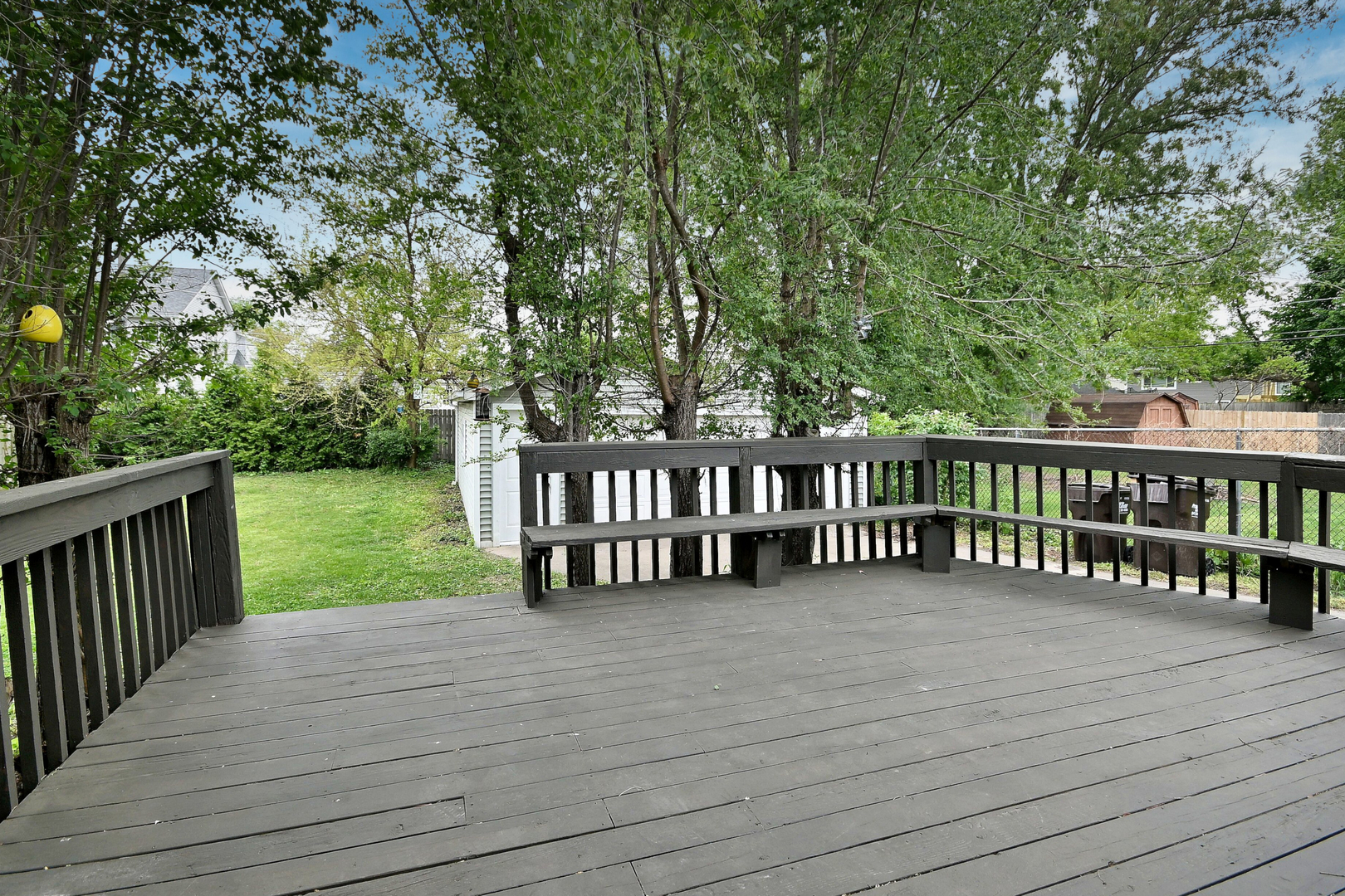 20564 Elizabeth Avenue Prairie View, IL 60089 - Photo 15 of 40 a view of a deck and a yard with wooden fence and floor