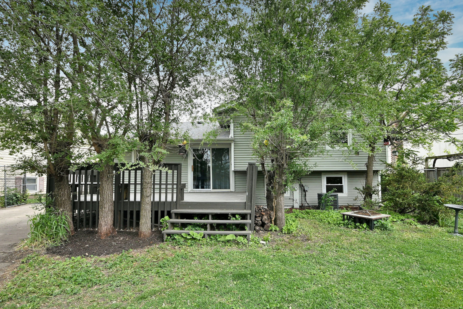 20564 Elizabeth Avenue Prairie View, IL 60089 - Photo 17 of 40 a view of house with a yard and deck