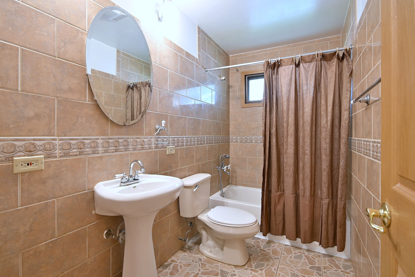 20564 Elizabeth Avenue Prairie View, IL 60089 - Photo 27 of 40 a bathroom with a sink toilet and shower