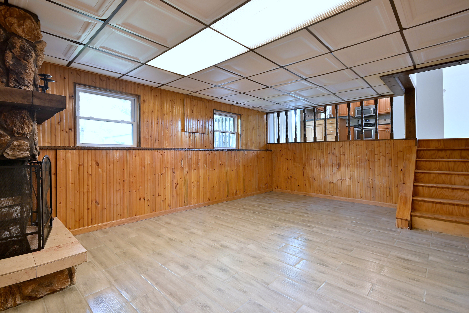 20564 Elizabeth Avenue Prairie View, IL 60089 - Photo 28 of 40 a view of an empty room with wooden floor and a window