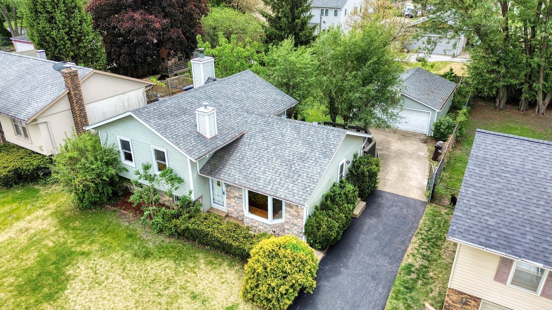 20564 Elizabeth Avenue Prairie View, IL 60089 - Photo 3 of 40 aerial view of a house with a yard and potted plants
