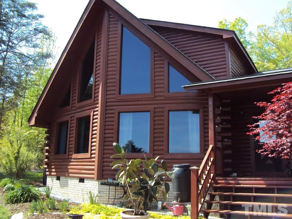 4009 Pixley Pritchard Road Timberlake, NC 27583 - Photo 3 of 25 Just look at those windows and enjoy the view