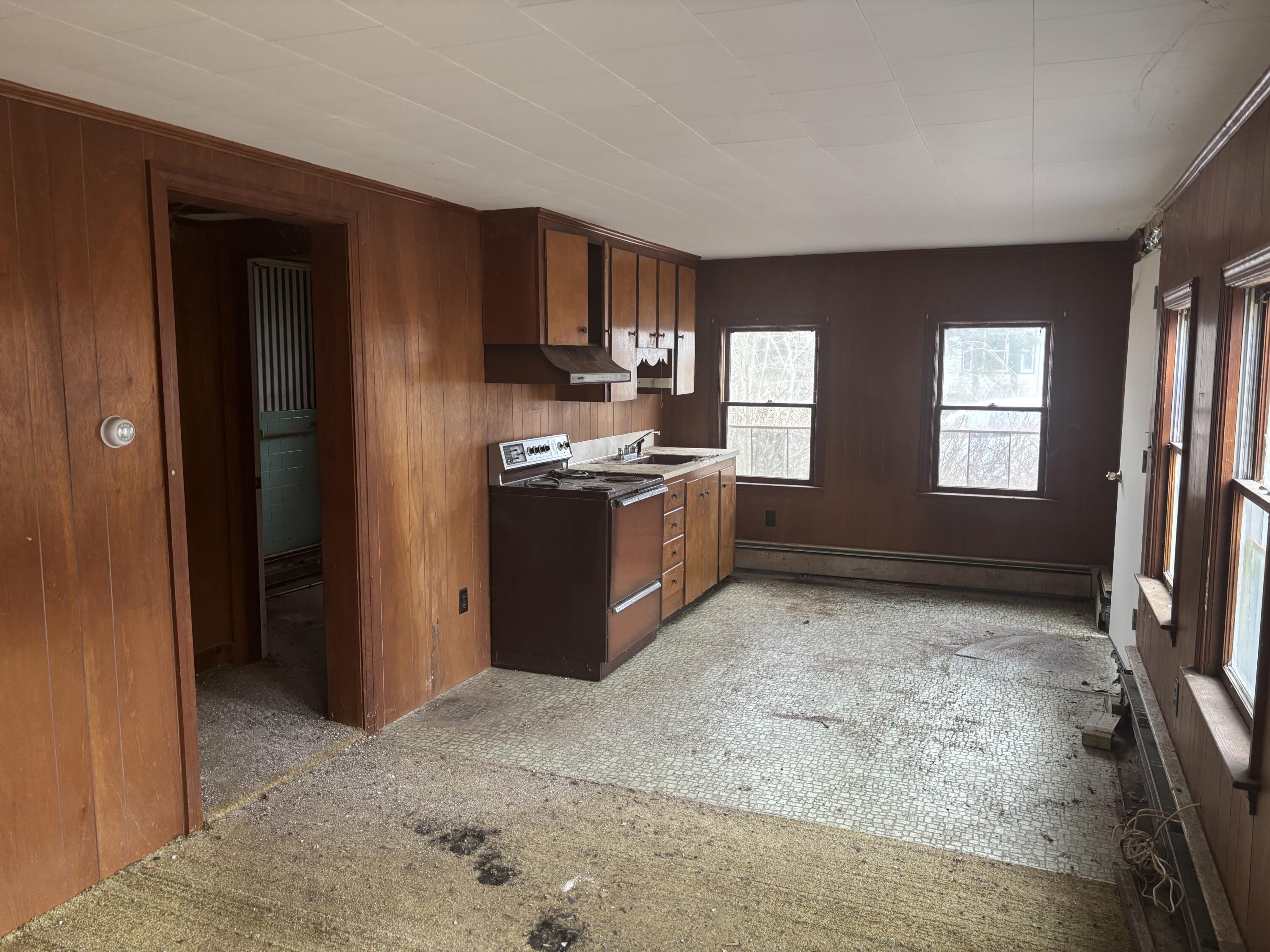 202 Route 28 West Harwich, MA 02671 - Photo 16 of 19 a kitchen with stainless steel appliances granite countertop a refrigerator and a sink