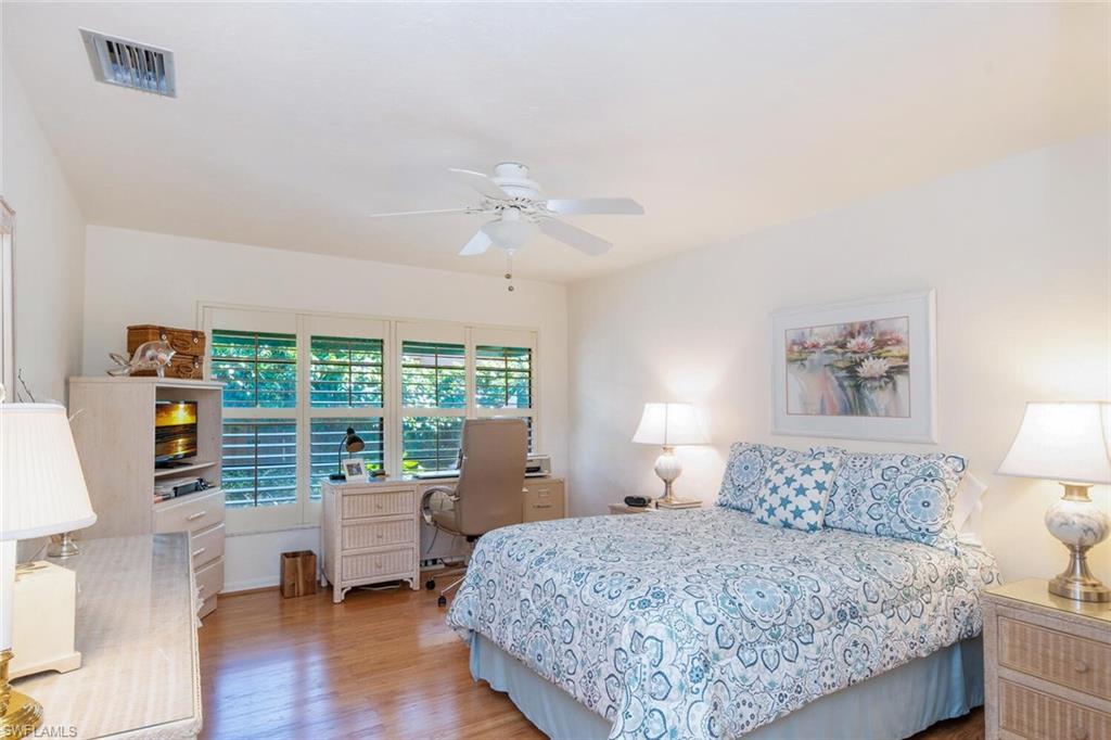 717 Reef Point Circle, Unit 12 Naples, FL 34108 - Photo 19 of 35 Master Bedroom