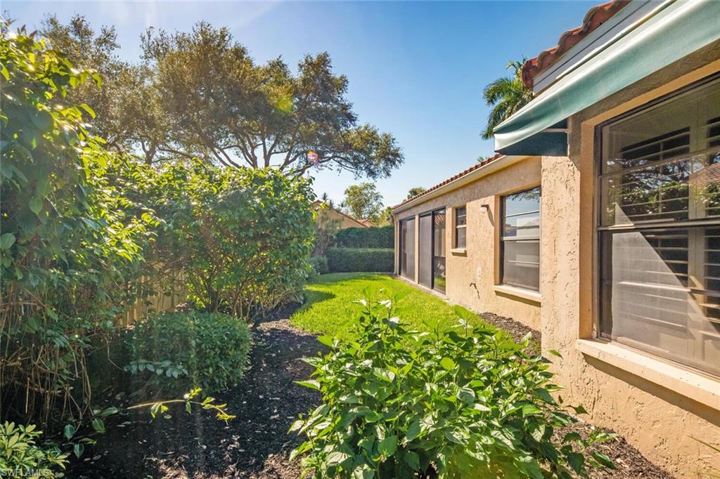 717 Reef Point Circle, Unit 12 Naples, FL 34108 - Photo 29 of 35 Rear Exterior