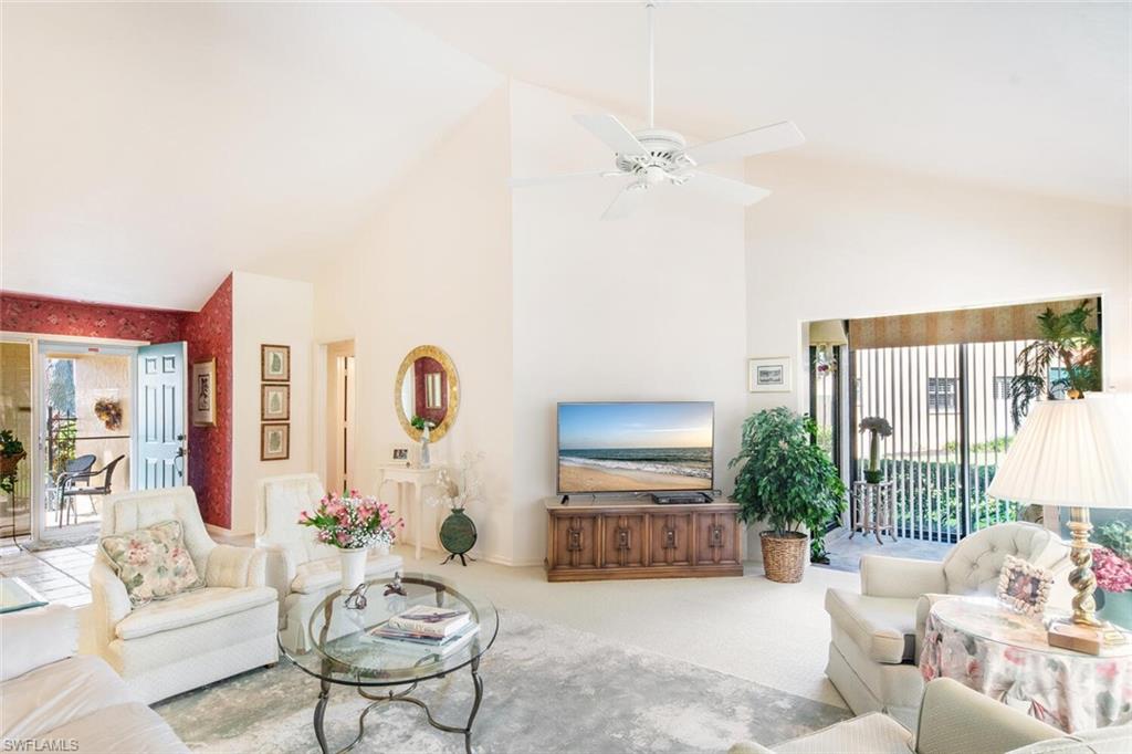 717 Reef Point Circle, Unit 12 Naples, FL 34108 - Photo 10 of 35 Living Room
