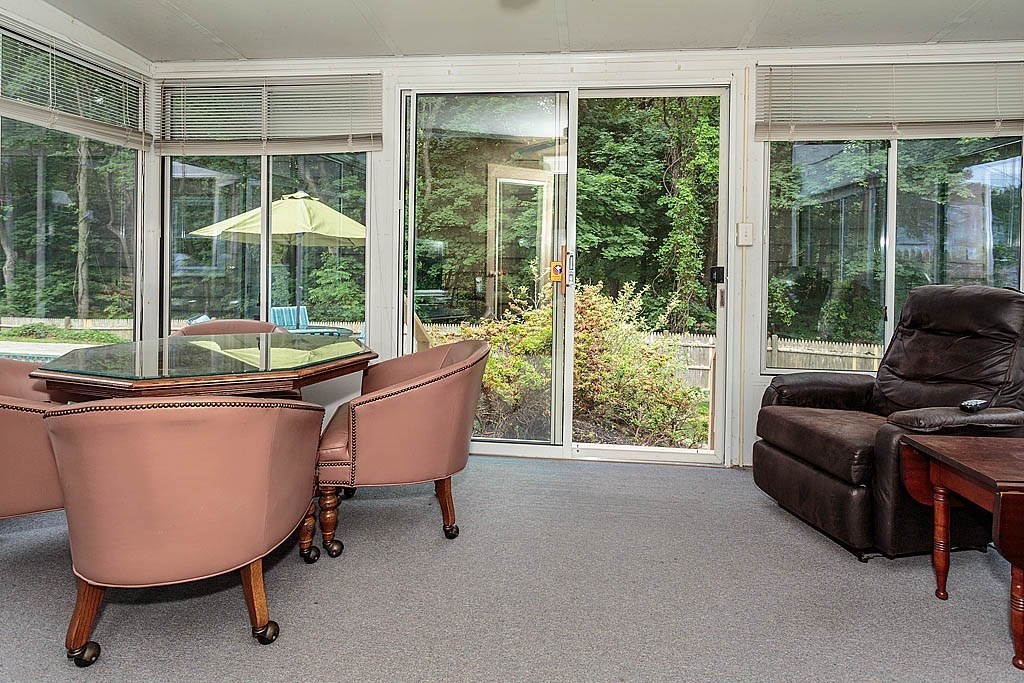 17 Dennett Road Winchester, MA 01890 - Photo 14 of 41 a living room with furniture and a window