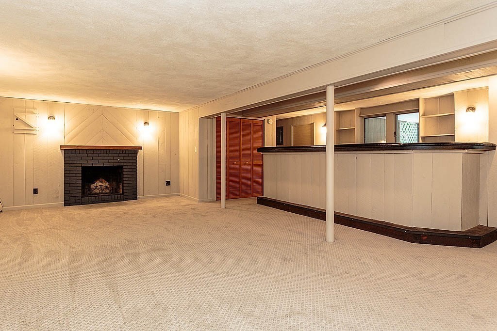 17 Dennett Road Winchester, MA 01890 - Photo 25 of 41 a view of an empty room with a window