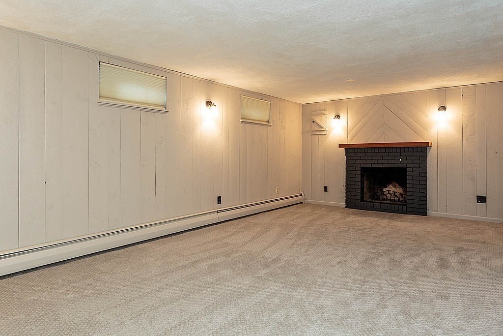 17 Dennett Road Winchester, MA 01890 - Photo 26 of 41 a view of empty room with fireplace