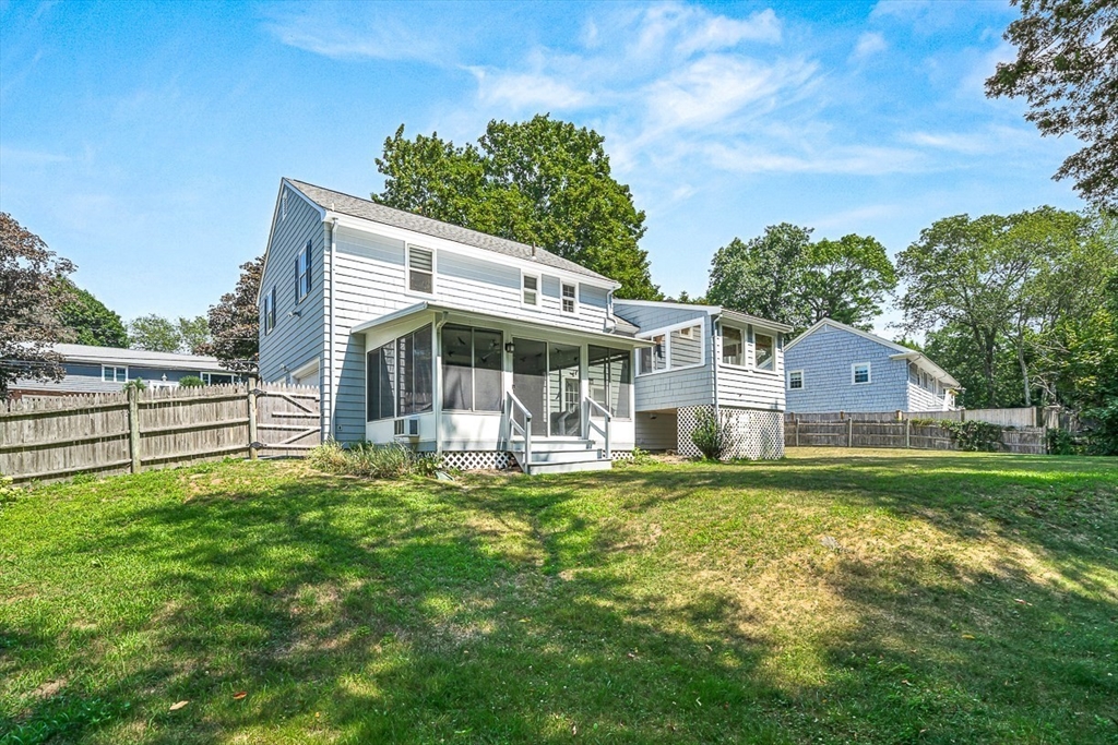 17 Dennett Road Winchester, MA 01890 - Photo 29 of 41 a view of a house with a yard and sitting area