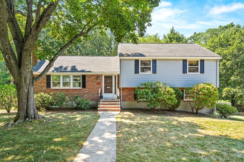 17 Dennett Road Winchester, MA 01890 - Photo 31 of 41 a front view of a house with a yard