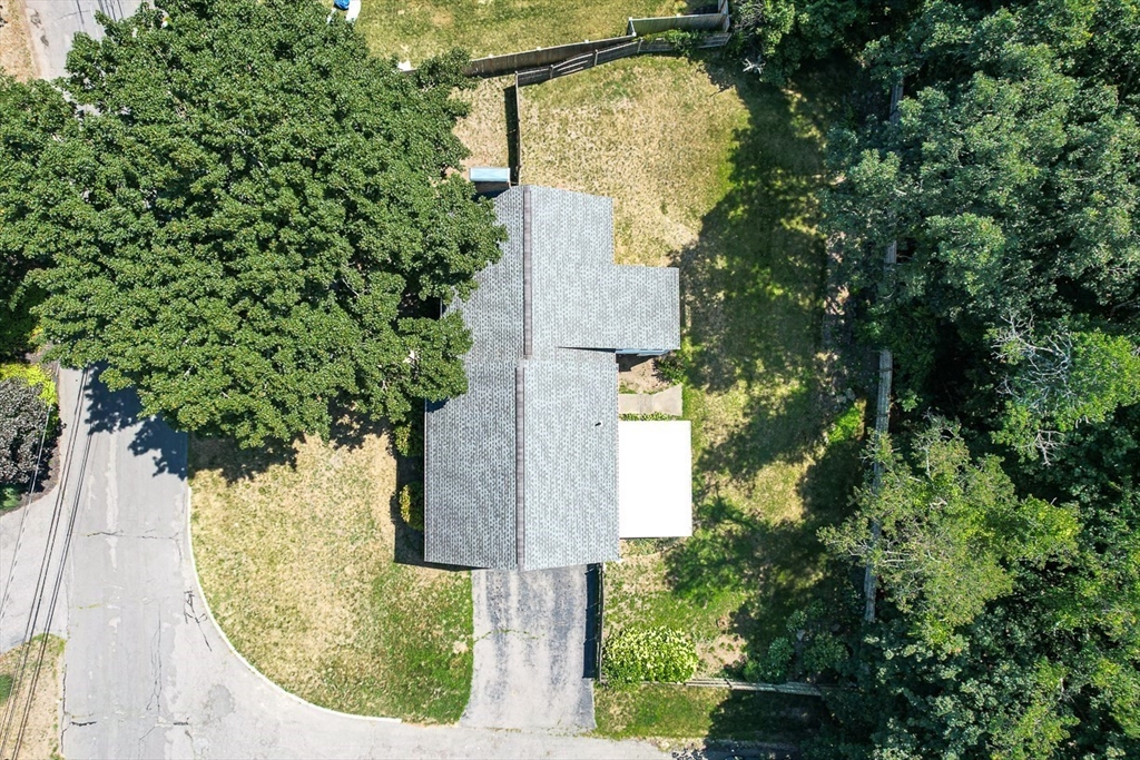 17 Dennett Road Winchester, MA 01890 - Photo 33 of 41 an aerial view of a house with a yard and wooden fence