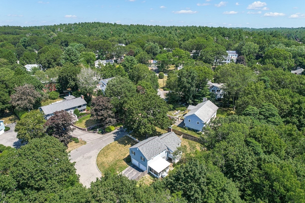 17 Dennett Road Winchester, MA 01890 - Photo 35 of 41 an aerial view of a house with yard and outdoor seating