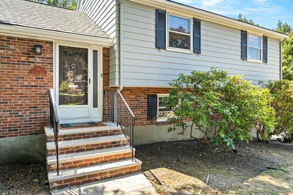 17 Dennett Road Winchester, MA 01890 - Photo 4 of 41 a front view of a house with a porch