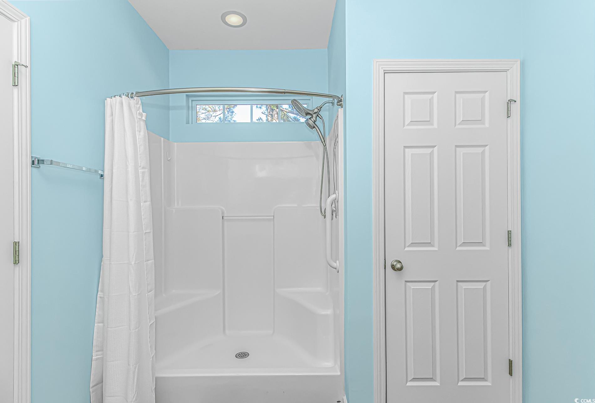 139 Chenoa Drive, Unit D Murrells Inlet, SC 29576 - Photo 13 of 34 Full bath featuring a shower with shower curtain