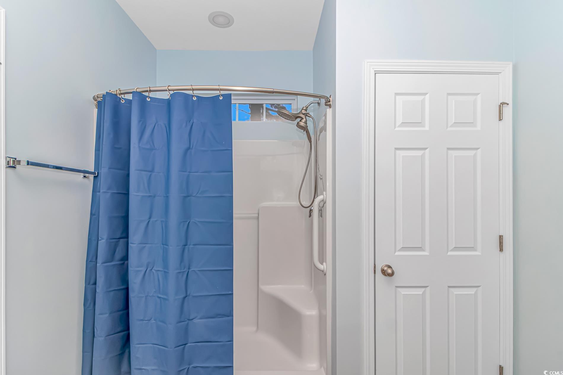 139 Chenoa Drive, Unit D Murrells Inlet, SC 29576 - Photo 14 of 34 Full bathroom with curtained shower