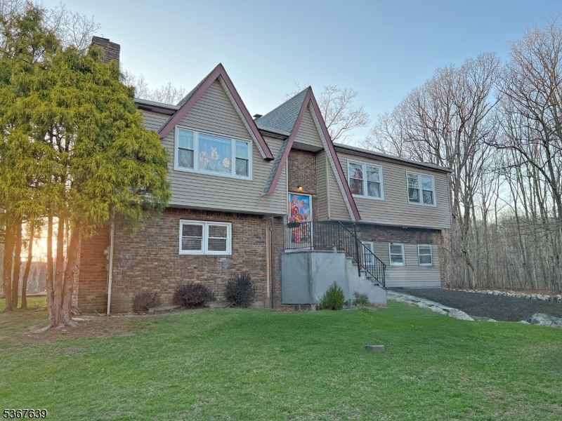 29 Billings Road Hopatcong, NJ 07843 - Photo 1 of 14 front view of a house with a yard