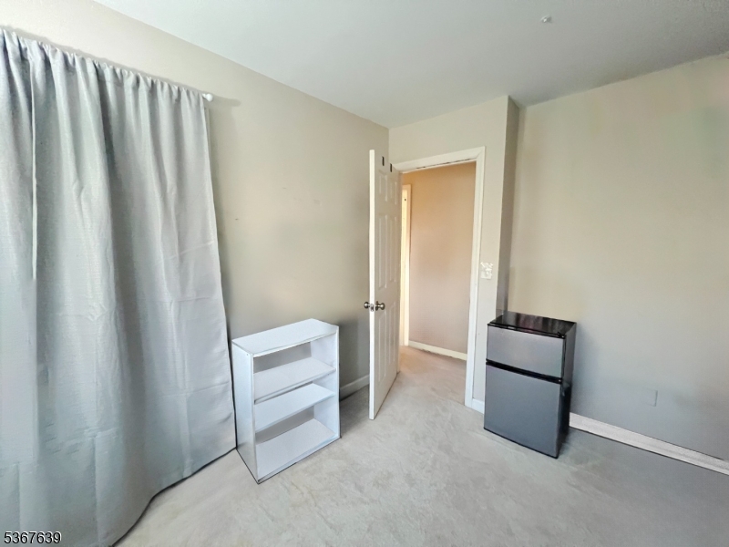 29 Billings Road Hopatcong, NJ 07843 - Photo 13 of 14 a view of room with window and closet