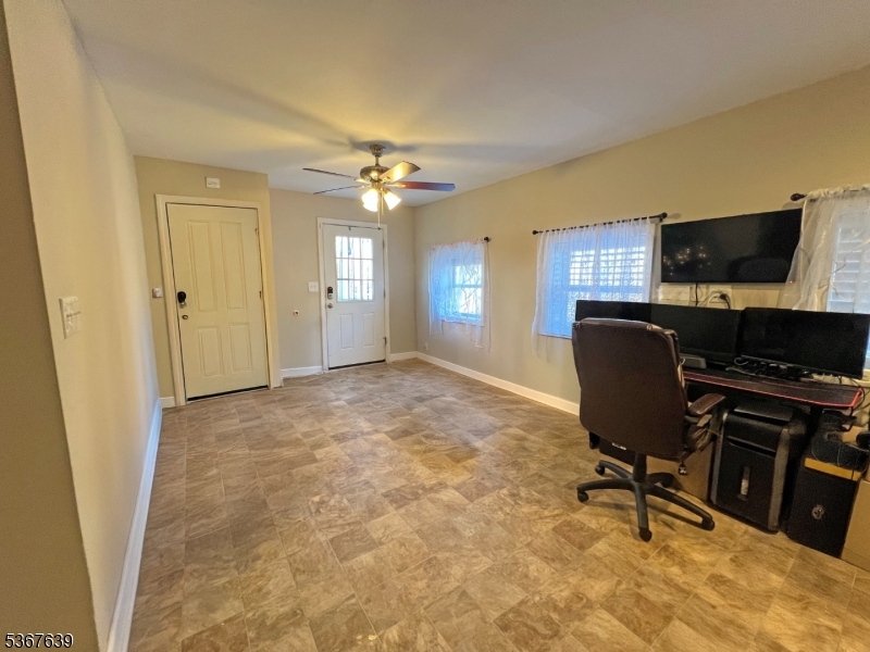 29 Billings Road Hopatcong, NJ 07843 - Photo 3 of 14 a view of a workspace with furniture and a window