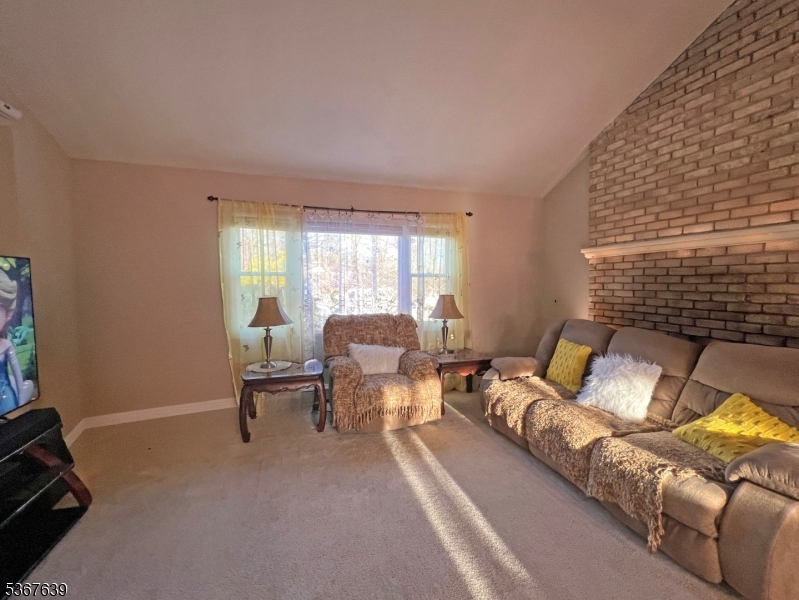 29 Billings Road Hopatcong, NJ 07843 - Photo 7 of 14 a living room with furniture and a window