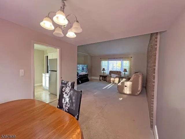 a bed room with a bed and a large mirror