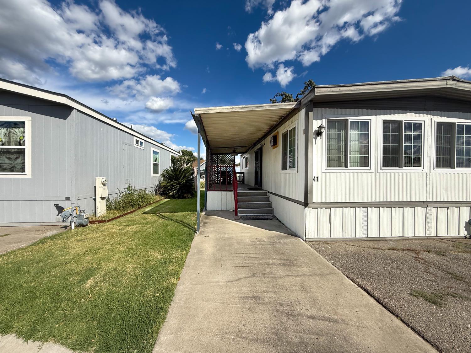 5835 Cherokee Road, Unit 41 Stockton, CA 95215 - Photo 6 of 35 a view of a house with backyard and porch
